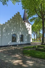 Bogense on the Kattegat, St Nicolas Church, Danish architecture, stepped gables, group of trees,