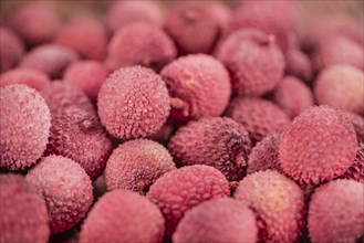 Portion of fresh Lychees (close-up shot, selective focus)