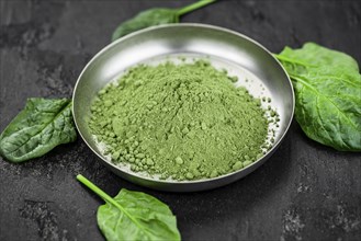 Freshly made green spinach powder (detailed close up shot, selective focus)