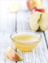 Portion of Applesauce (selective focus) on vintage background (close-up shot)