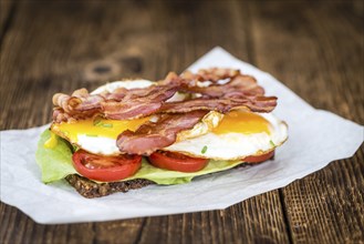 Fresh made Bacon and Egg Sandwich (selective focus, close-up shot)