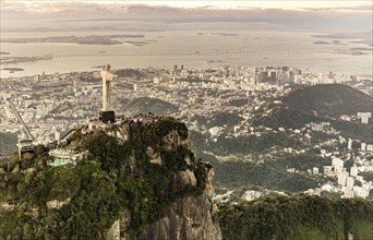 Cristo Redentor statue in Rio de Janeiro (aerial shot made from a helicopter) during a spectacular