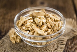 Portion of fresh Walnut kernels (close-up shot, selective focus)