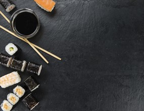 Slate slab with some Sushi (selective focus, close-up shot)