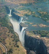 Victoria Falls in Zimbabwe at drought, aerial shot made from a helicopter