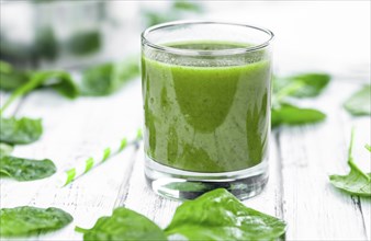 Freshly made spinach smoothie (detailed close up shot, selective focus)