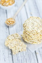 Fresh made Corn Waffles (close-up shot, selective focus) on vintage wooden background