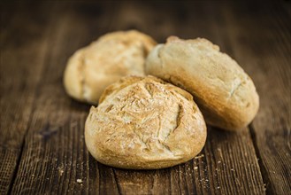 Fresh made German Buns on a vintage background as detailed close-up shot