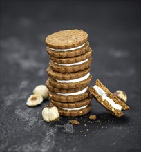 Hazelnut Cream Cookies as detailed close up shot (selective focus)