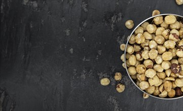 Peeled Hazelnuts as detailed close up shot (selective focus)