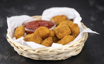 Chicken Nuggets as detailed close-up shot (selective focus)