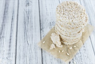 Portion of Rice Cakes (close-up shot) on wooden background