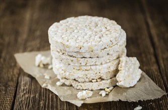 Old wooden table with Rice Cakes (detailed close-up shot)