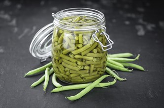 Portion of canned Green Beans (close-up shot, selective focus)