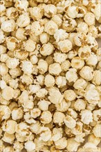 Some homemade Popcorn as detailed close-up shot, selective focus