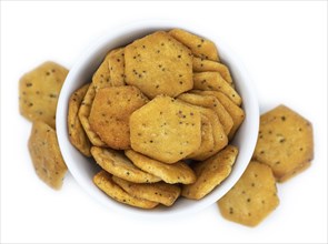 Portion of mixed Snacks isolated on white background (detailed close up shot, selective focus)