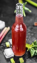 Homemade Rhubarb Spritzer as detailed close up shot (selective focus)