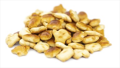 Portion of mixed Snacks isolated on white background (detailed close up shot, selective focus)