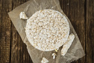 Some Rice Cakes on an old wooden background (detailed close-up shot)