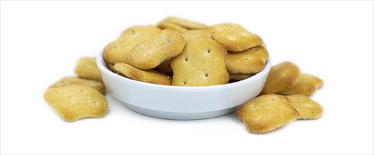 Portion of mixed Snacks isolated on white background (detailed close up shot, selective focus)