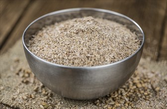 Portion of Wheat Bran as detailed close-up shot, selective focus