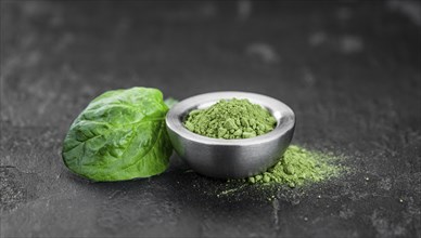 Freshly made green spinach powder (detailed close up shot, selective focus)