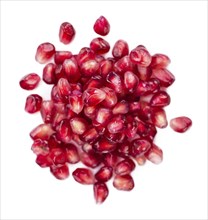 Portion of Pomegranate (as close-up shot) isolated on white background