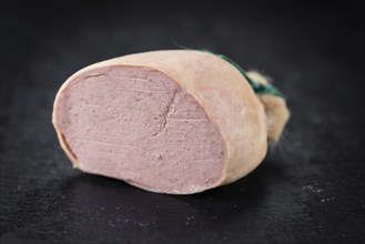 Portion of fresh made Liverwurst (close-up shot, selective focus)