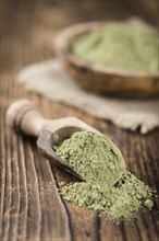 Stevia Powder on an old wooden table (close-up shot)