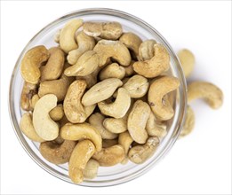 Cashew Nuts isolated on white background (close up shot, selective focus)