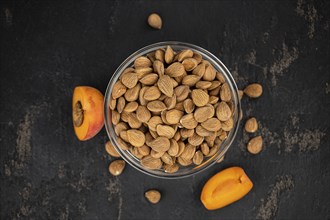 Some shelled Apricot Kernels as detailed close up shot (selective focus)