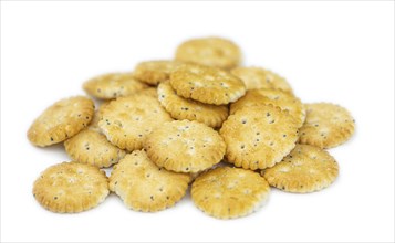 Portion of mixed Snacks isolated on white background (close up shot, selective focus)