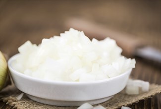 Some homemade White Onions (dices) as detailed close-up shot, selective focus