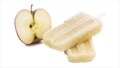 Fresh made Apple Popsicles (close-up shot) isolated on white background