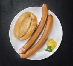 Wiener Sausages on a vintage background as detailed close-up shot (selective focus)