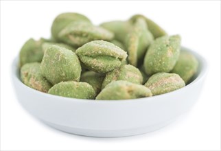 Peanuts (with Wasabi flavor) isolated on white background (selective focus, close-up shot)