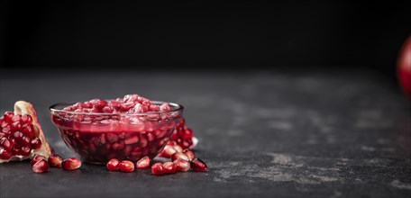 Some fresh preserved Pomegranate seeds (selective focus, close-up shot)