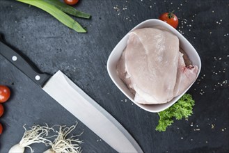 Chicken Cutlet on a slate slab (detailed close-up shot)