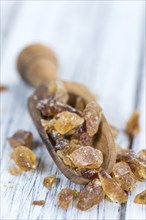 Portion of brown Rock Candy as detailed close-up shot (selective focus)