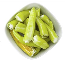 Pimientos (filled with cream cheese) isolated on white background (selective focus, close-up shot)