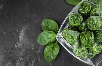 Portion of frozen spinach as detailed close up shot (selective focus)