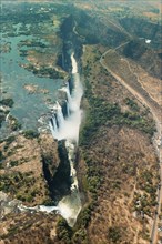 Victoria Falls in Zimbabe at dry time as aerial shot made out of a helicopter