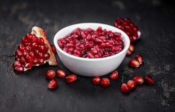 Some fresh preserved Pomegranate seeds (selective focus, close-up shot)