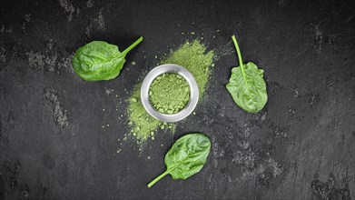 Freshly made green spinach powder (detailed close up shot, selective focus)