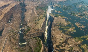 Victoria Falls at drought near Livingstone, Zimbabwe, as aerial shot made from a helicopter, Africa