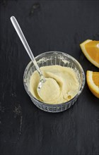 Fresh made Orange fruit Powder as detailed close-up shot (selective focus)