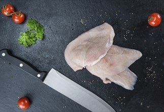 Chicken Cutlet on a slate slab (detailed close-up shot)