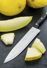 Portion of fresh made Honeydew Melon (close-up shot, selective focus)