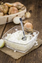 Some homemade White Onions (dices) as detailed close-up shot, selective focus