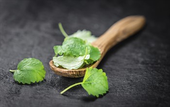 Balm on a vintage background as detailed close-up shot (selective focus)